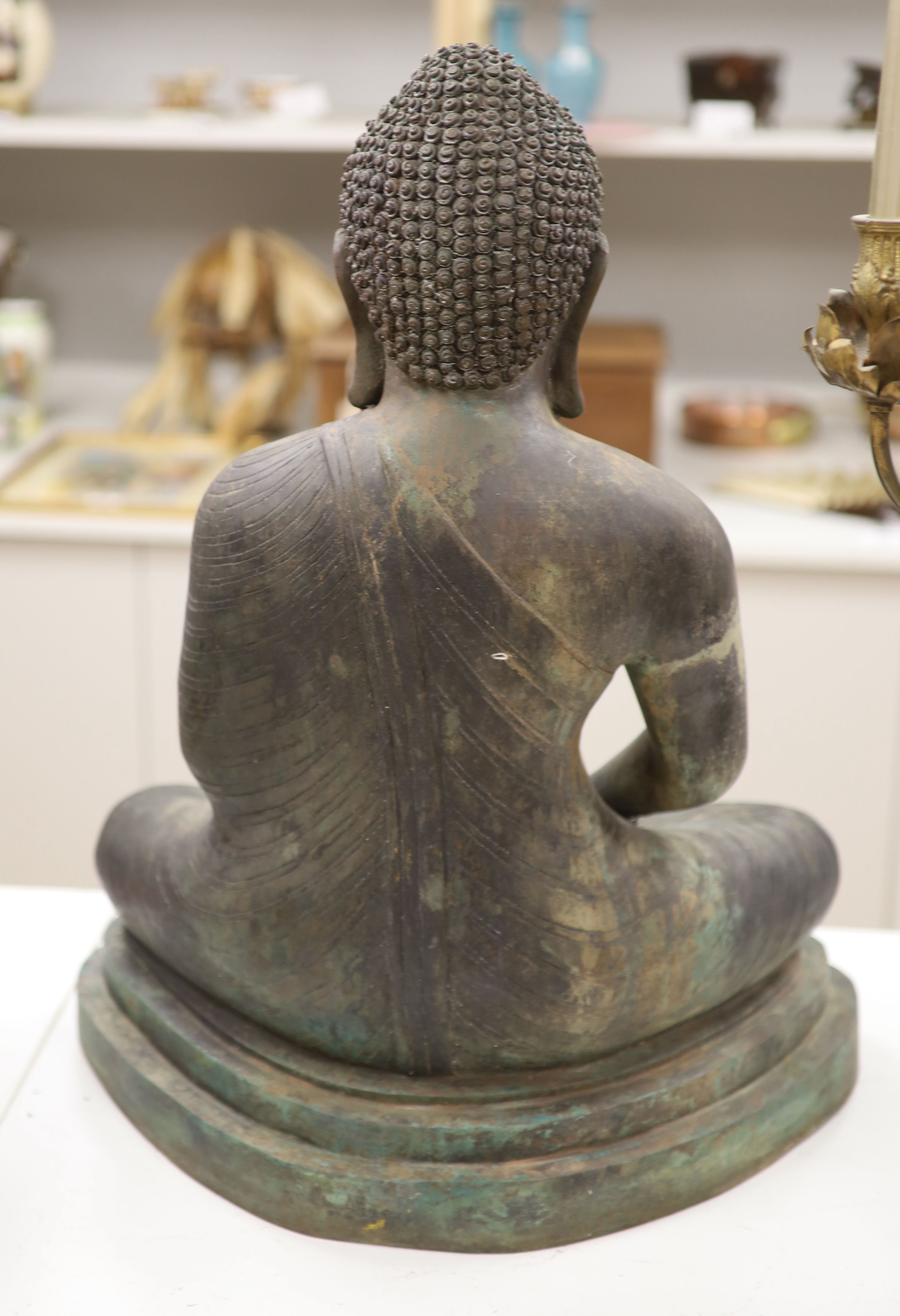 A Sino Tibetan bronze buddha, height 65cm